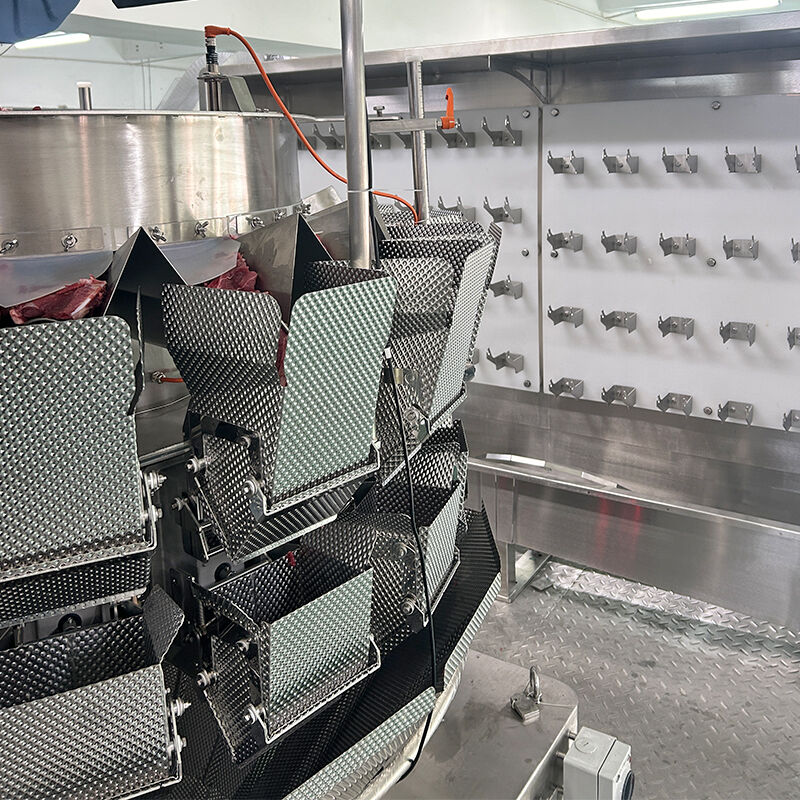 Linia automatycznego pakowania w tace z wykorzystaniem wagi wielogłowicowej i podajnika ślimakowego do produktów mrożonych